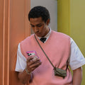 TORRAS Ostand Q3 Air case for iPhone 17 Pro, pink colorblock design with magnetic stand.