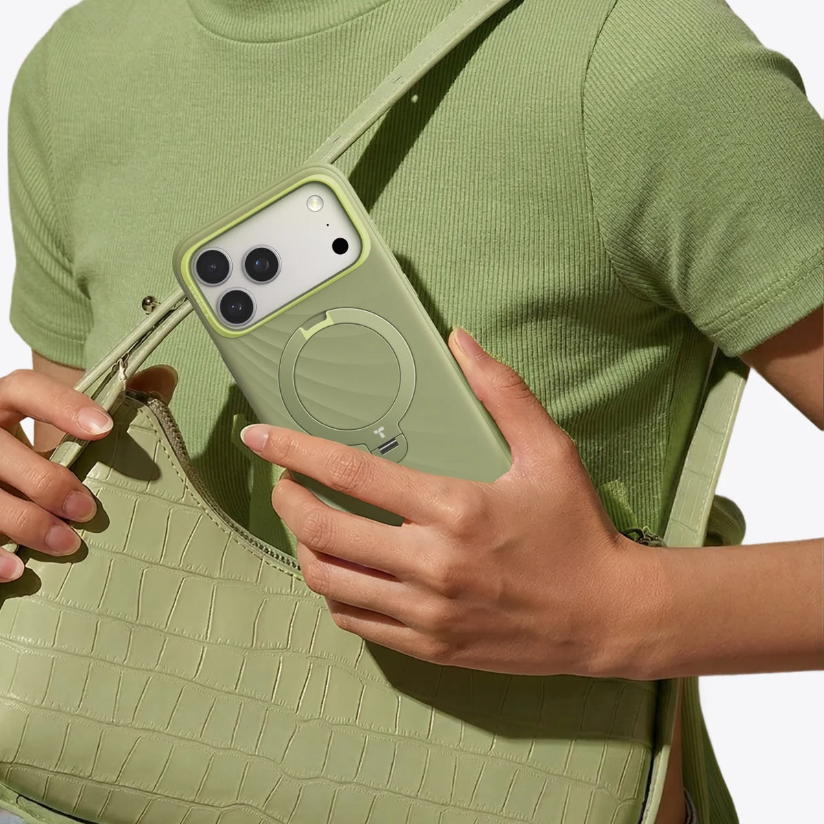 TORRAS Ostand Q3 green silicone case for iPhone 17 Pro Max with magnetic stand