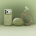 Sage green TORRAS Ostand Q3 Silicone Wind Limited iPhone 17 Pro Max case with magnetic stand, pebble charger, and lanyard.