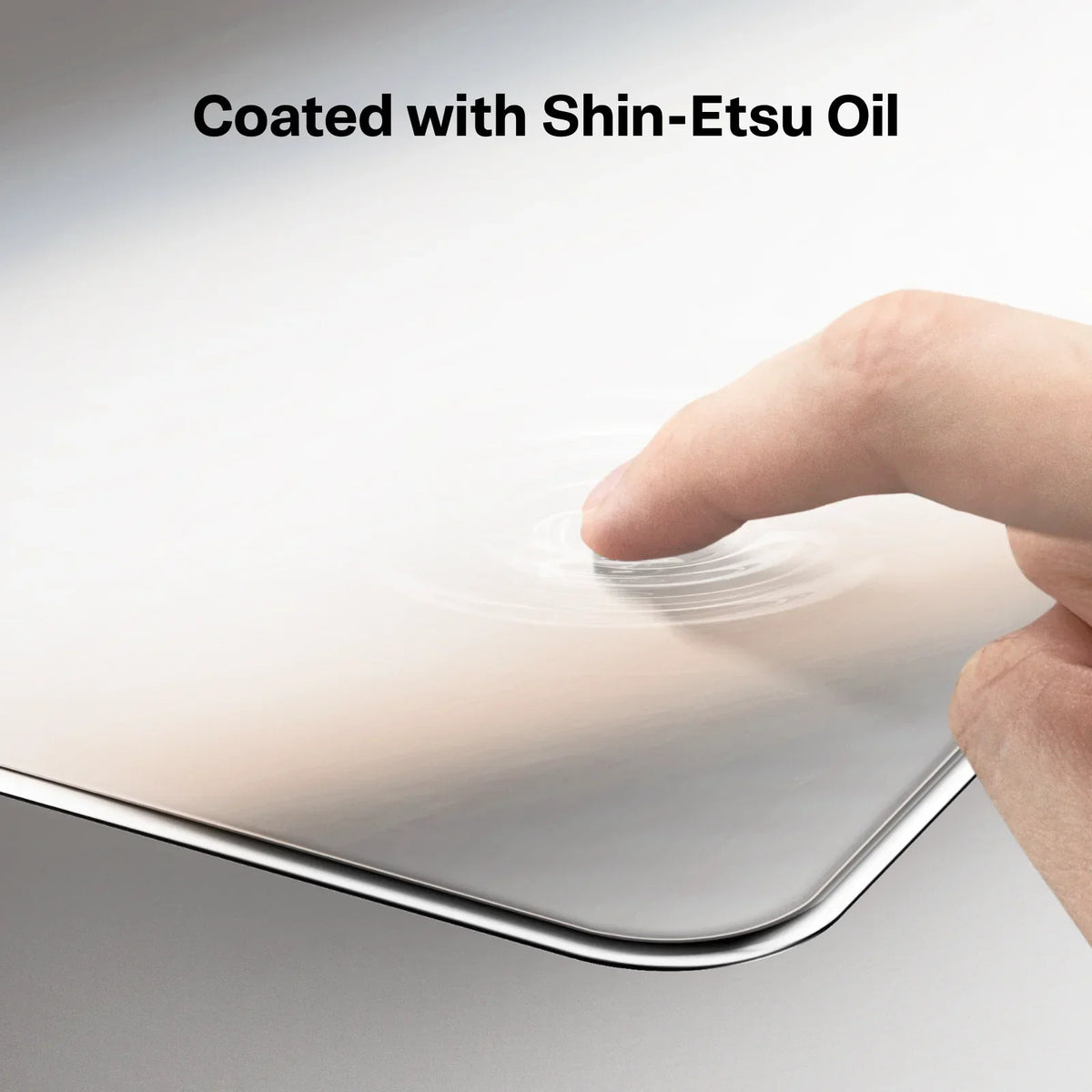 GlassGo iPad Mini screen protector with Shin-Etsu Oil coating, showing touch effect.