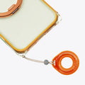 TORRAS Ostand O3 Air Bios iPhone 17 Pro case, clear with orange frame, magnetic stand, and lanyard.