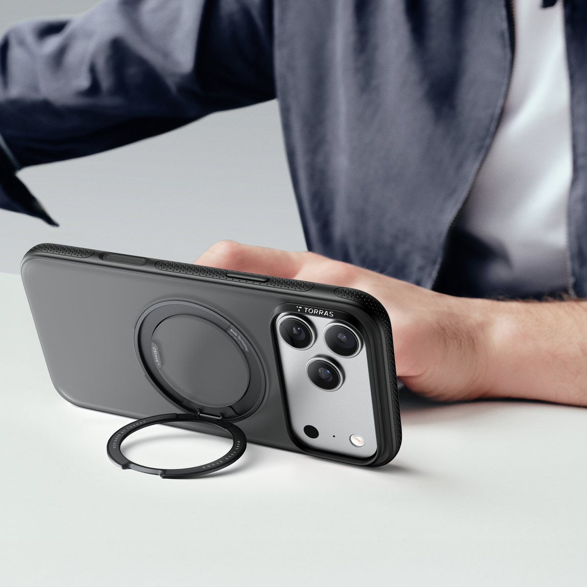 TORRAS Ostand O3 Fitness case for iPhone 17 Pro with magnetic ring stand.