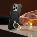Black TORRAS Ostand Q3 VegSkin iPhone 16 Pro Max case, gold camera accent, magnetic ring stand.