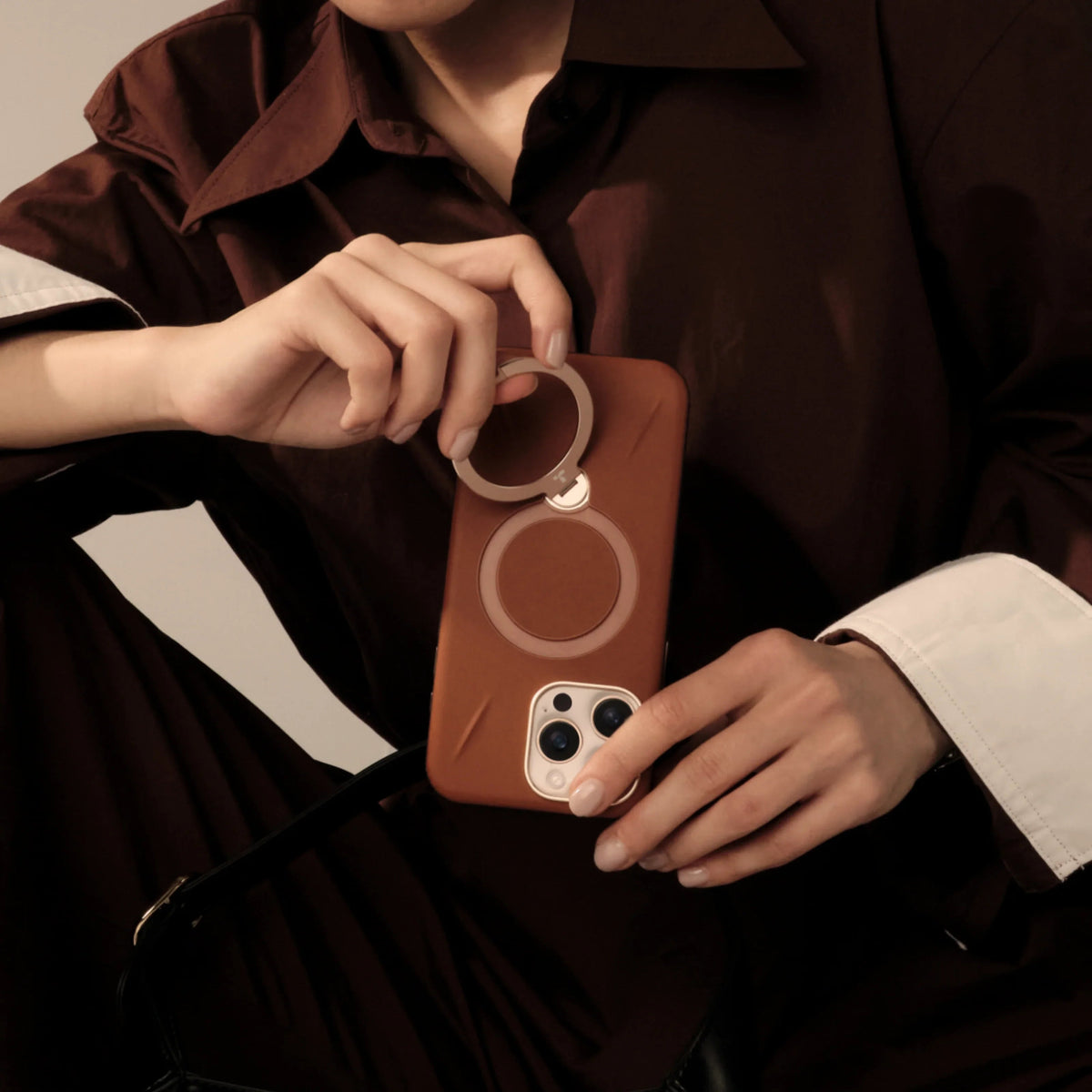 TORRAS Ostand Q3 VegSkin case for iPhone 16 Pro Max with magnetic ring stand.