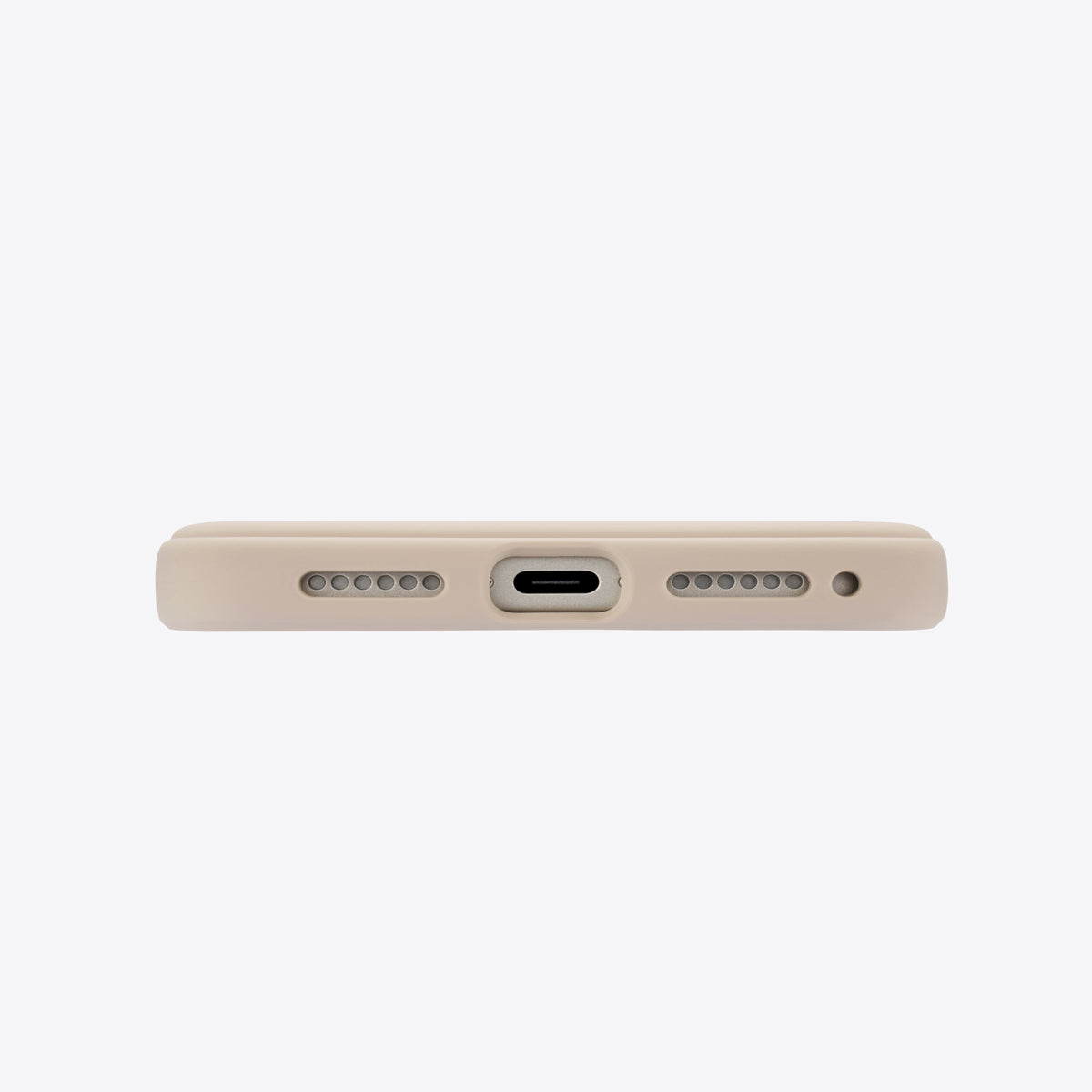 TORRAS Ostand Q3 beige silicone case for iPhone 17 Pro Max: bottom port and speaker grilles.