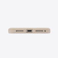 TORRAS Ostand Q3 beige silicone case for iPhone 17 Pro Max: bottom port and speaker grilles.