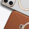TORRAS Ostand Q3 VegSkin iPhone 17 Pro case: white calfskin with gold accents, brown with stand.