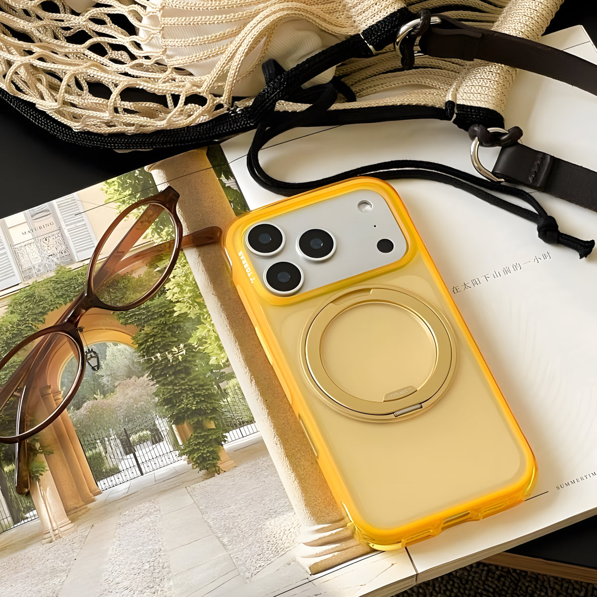 Yellow TORRAS Ostand O3 Air Classic case with gold ring kickstand for iPhone 17 Pro Max.